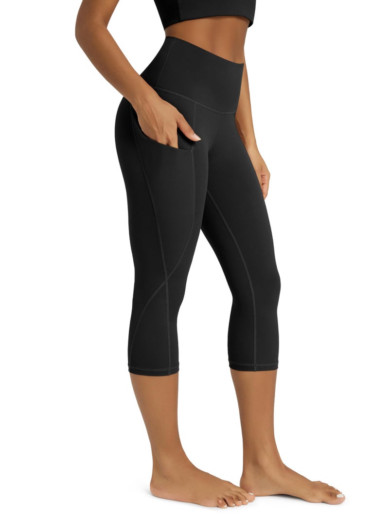 ODODOS Women's High Waisted Yoga Capris with Pockets,Tummy Control Non See Through Workout Sports Running Capri Leggings, Black,X-Large - Image 1